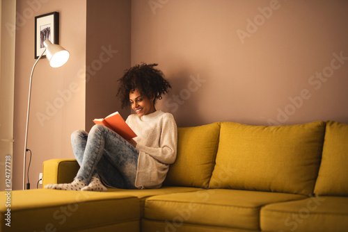 Reading a funny book photo