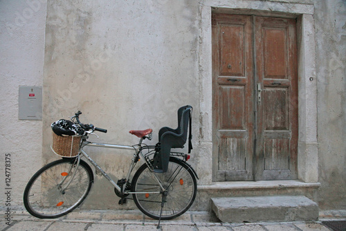 bicycle by wood door © danheller