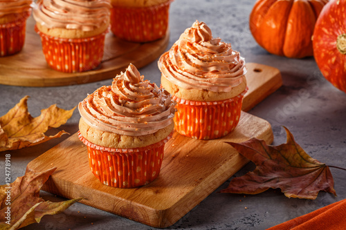 Pumpkin cupcakes with glitter sugar sprinkles. photo