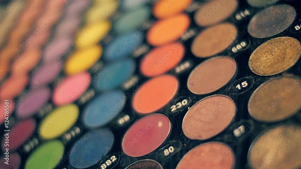 A large set of cosmetic palette of various colors. Closeup. Follow focus. Shallow depth of field A large set of cosmetic palette of various colors. Closeup. Follow focus. Shallow depth of field