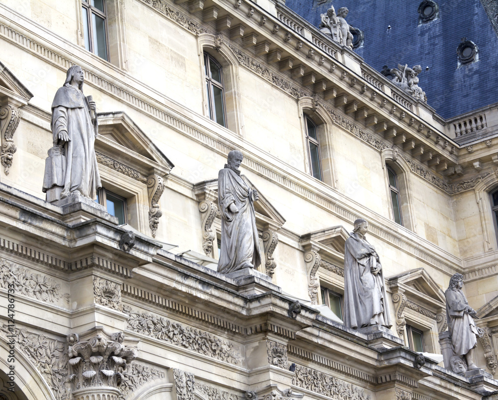  Louvre museum closeup exterior view on. With over 60k sqM of exhibition space, Louvre is the biggest Museum in Paris.