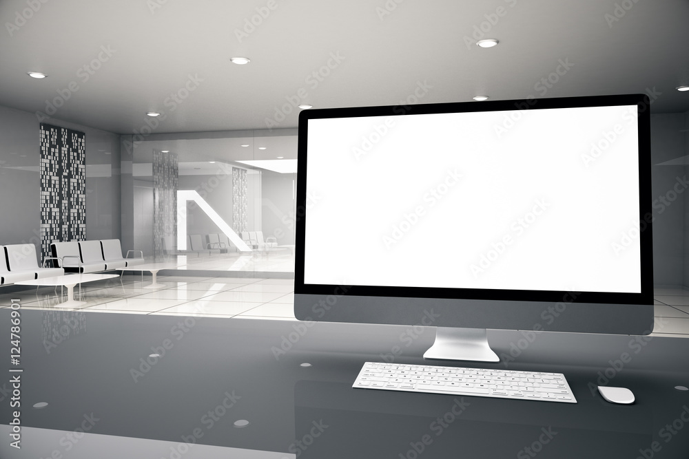 Fototapeta premium Blank computer in business interior