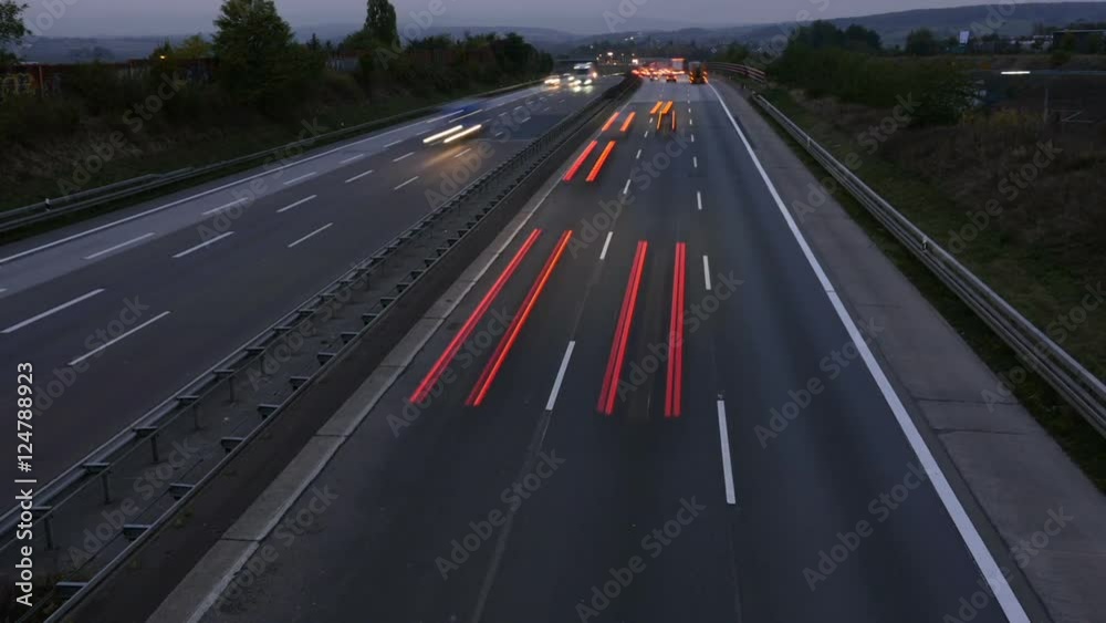 Tmelapse of traffic on German highway at dusk - high-angle view from a bridge Tmelapse of traffic on German highway at dusk - high-angle view from a bridge