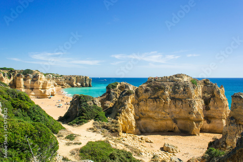 view of beautiful sandy beach Pria do Castelo, Algarve, portugal