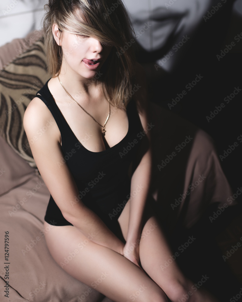 young sexy girl with big boobs in black T-shirt Stock Photo | Adobe Stock