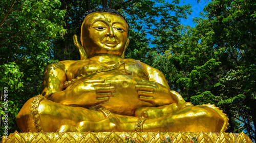 Golden Buddha at Entrance to Wat Phra That Doi Wao - Chiang Rai, Thailand photo