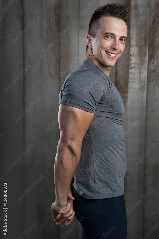 Portrait of strong and sporty young man after fitness exercise o Portrait of strong and sporty young man after fitness exercise o