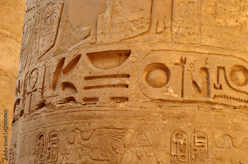 Ancient Egypt. The wall are decorated with carved hieroglyphs. Karnak Temple. Luxor. Thebes.