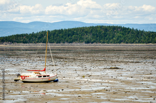 Sailboat at low tide