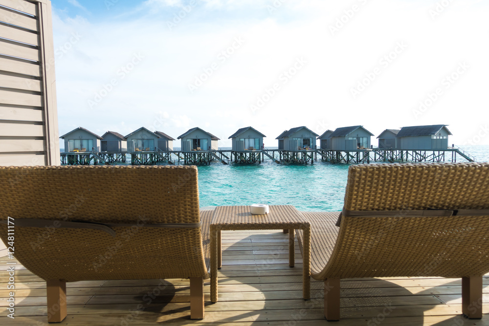 Beautiful tropical Maldives resort hotel with beach and blue wat Beautiful tropical Maldives resort hotel with beach and blue wat