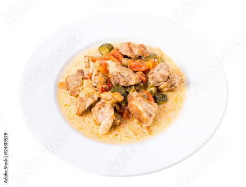 Baked pork meat with vegetables.