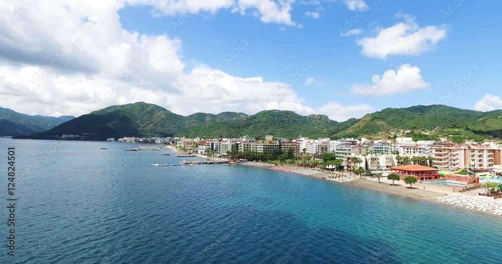 Camera fly under the sea in Turkey, Marmaris. Beautiful mountains, old town, hotels, and sea. Aerial view shooting with drone DJI Inspire1, 4k video. Sunny weather. Camera fly under the sea in Turkey, Marmaris. Beautiful mountains, old town, hotels, and sea. Aerial view shooting with drone DJI Inspire1, 4k video. Sunny weather.