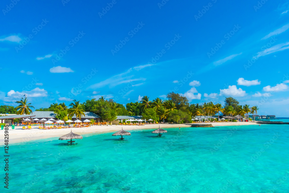 Beautiful tropical Maldives island with white sandy beach and se