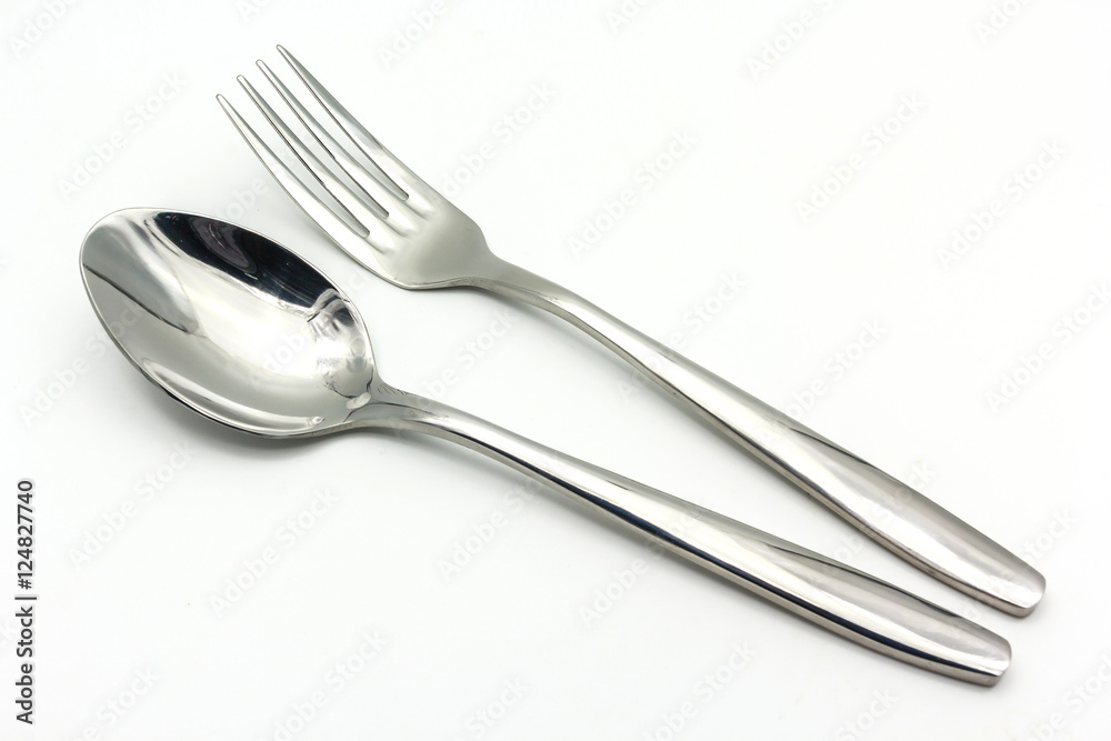 Cutlery set with Fork and Spoon isolated on white background with copy space for text. Cutlery set with Fork and Spoon isolated on white background with copy space for text.