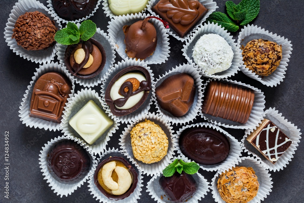 Assortment of chocolates, candies, parile and chocolate truffles. Top view
