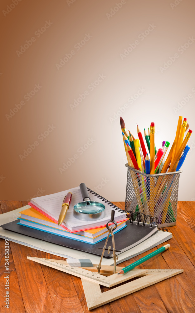 Fototapeta premium many stationer on wooden table closeup