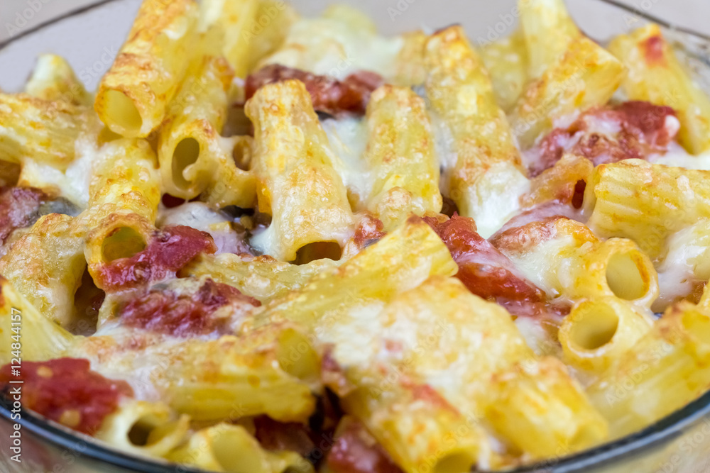 Cooked pasta with cheese and sauce Cooked pasta with cheese and sauce