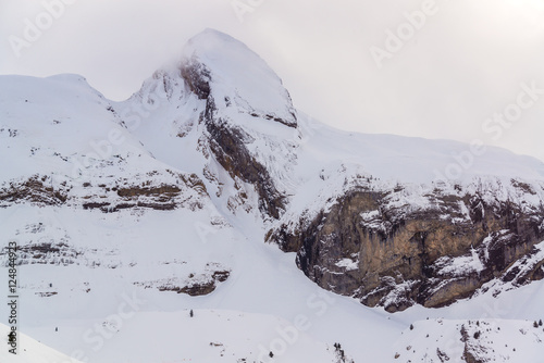 Snowy mountains in the Candanchu ski resort, in the Aragon Valley, Aragon Pyrenees, Spain. In the view the famous 