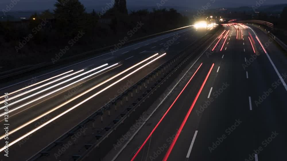 Tmelapse of traffic on German highway at dusk - high-angle view from a bridge Tmelapse of traffic on German highway at dusk - high-angle view from a bridge