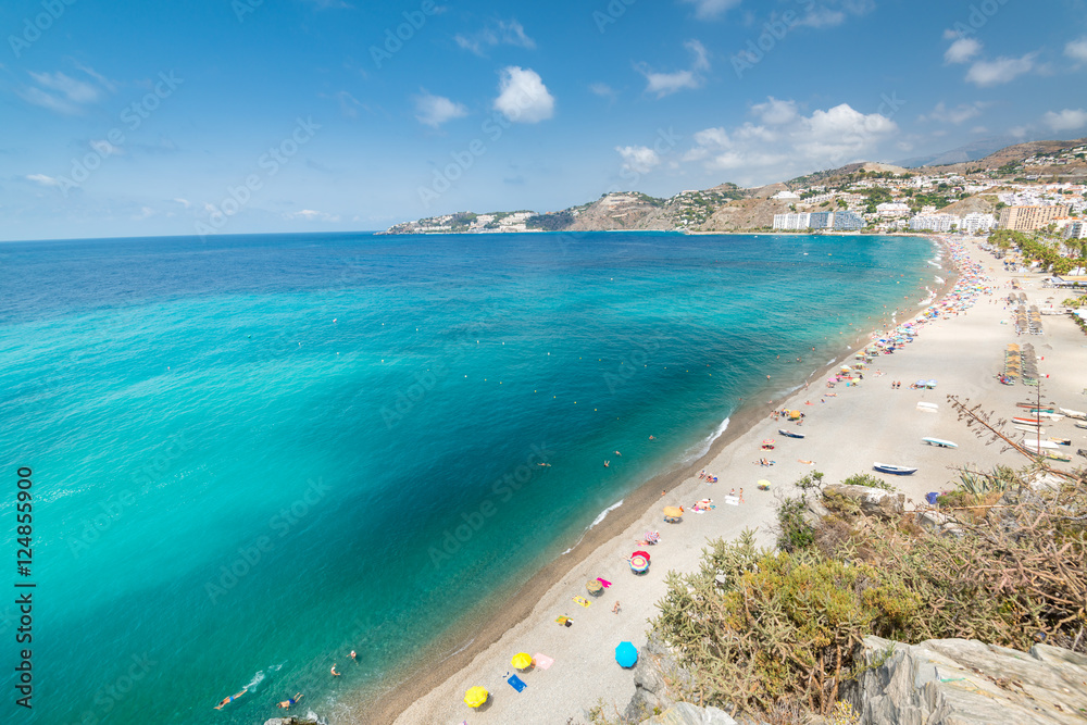 Obraz premium An aerial view of a mediterranean spanish beach (San Cristobal beach) at Almunecar, Granada, Spain