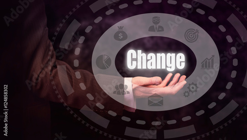 Fotografie Businessman holding a Change concept.