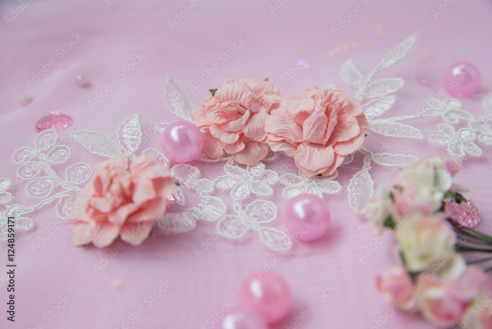 pink flowers and beads.