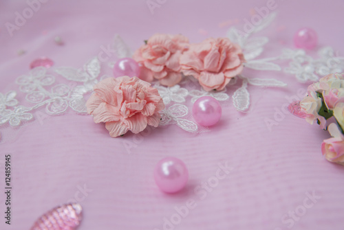 pink flowers and beads.. © alexlaz
