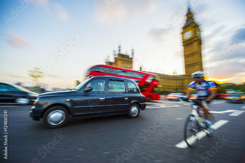 Photography Traffic and cyclists share the road in motion blur on Westminster Bridge with a