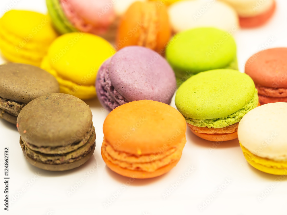 Colorful macaron cookies on white background, select and soft focus Colorful macaron cookies on white background, select and soft focus