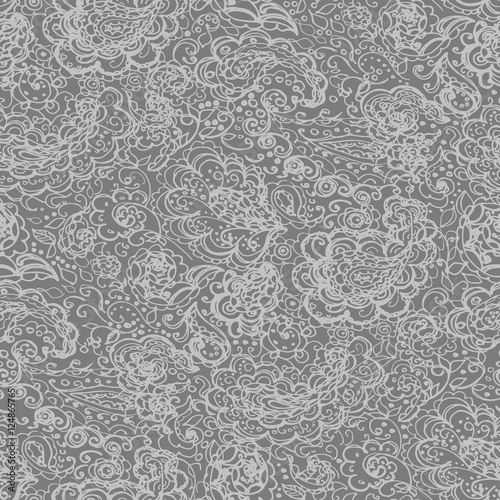 Floral doodle seamless wallpaper pattern. Illustration with paisley ornaments. Textile with hand-drawn flowers.