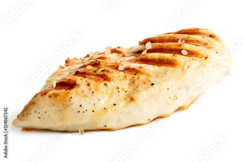  Whole grilled chicken breast with black pepper and rock salt.