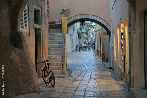 bicycle by arched narrow street
