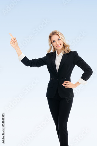 businesswoman, showing something or copyspace