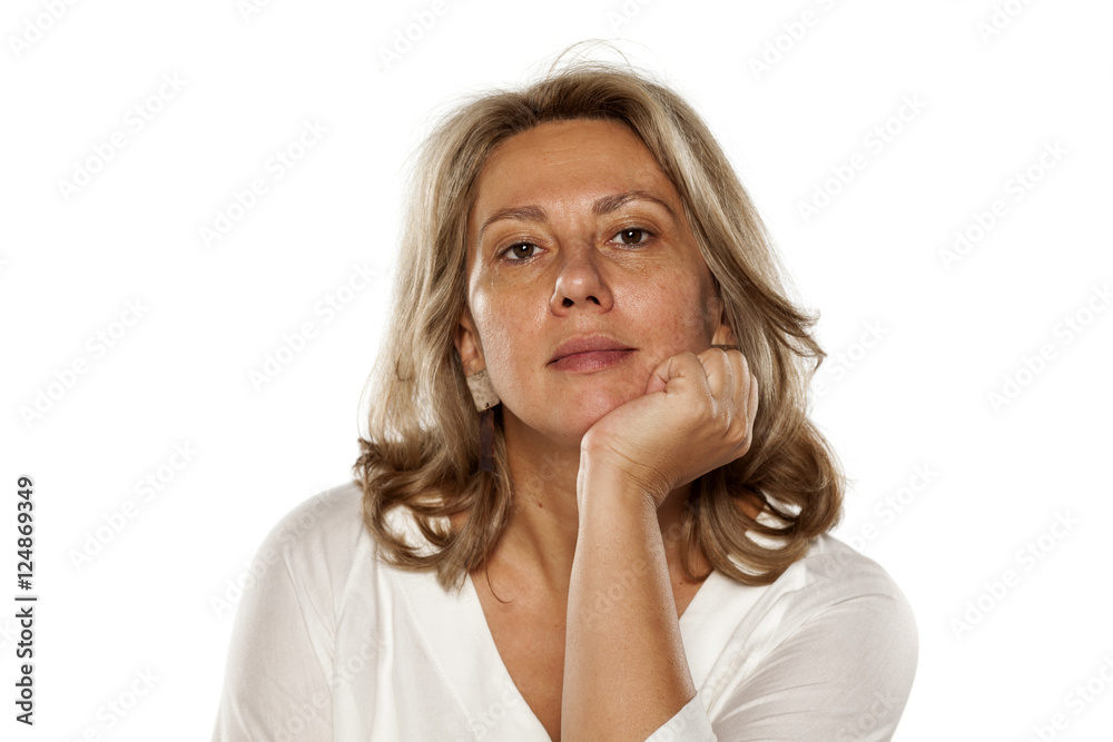 Portrait of beautiful middle-aged thoughtful womanl Portrait of beautiful middle-aged thoughtful womanl