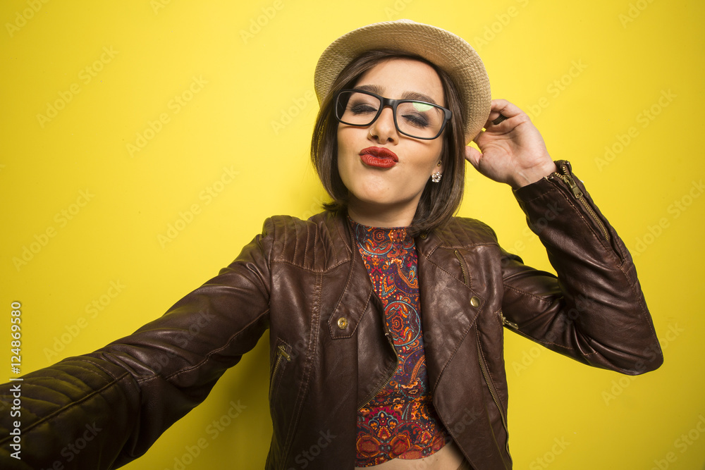Portrait of a Beautiful successful smiling girl doing selfie on Portrait of a Beautiful successful smiling girl doing selfie on