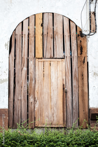 old and vintage wood door in the temple Thailand  photo