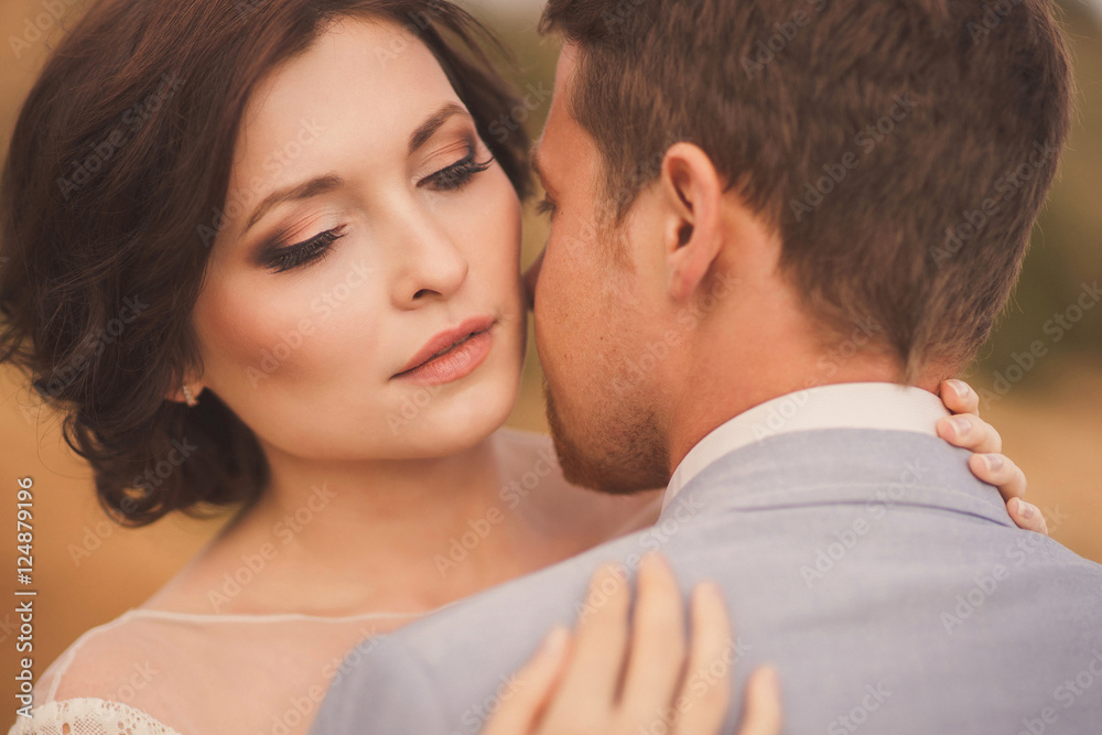 Closeup portrait of a romantic and stylish caucasian couple hugging. Love, relationships, romance, happiness concept. Closeup portrait of a romantic and stylish caucasian couple hugging. Love, relationships, romance, happiness concept.