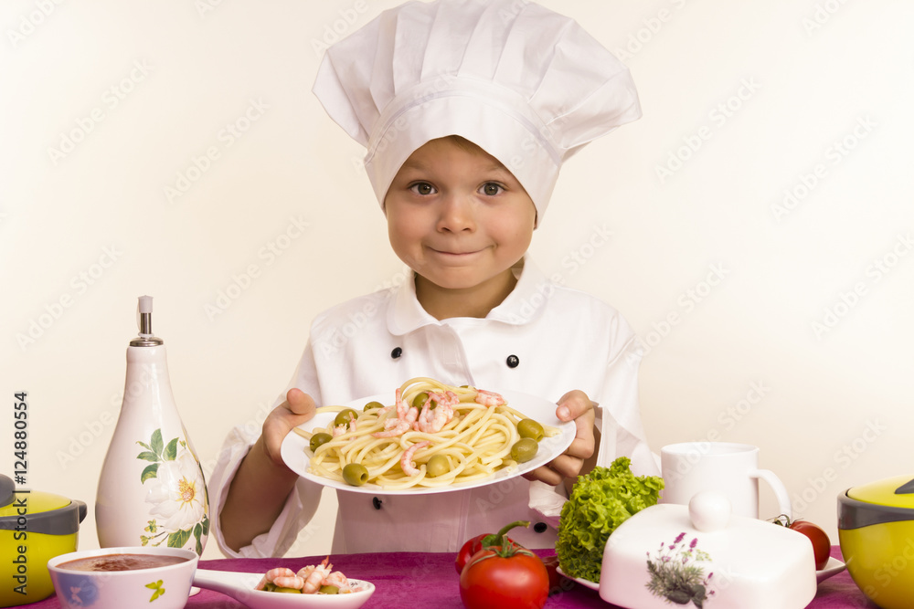 Chef preparing pasta with shrimp Chef preparing pasta with shrimp
