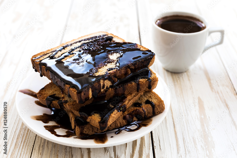 Fresh Toast with hot chocolate and cup of espresso. Fresh Toast with hot chocolate and cup of espresso.