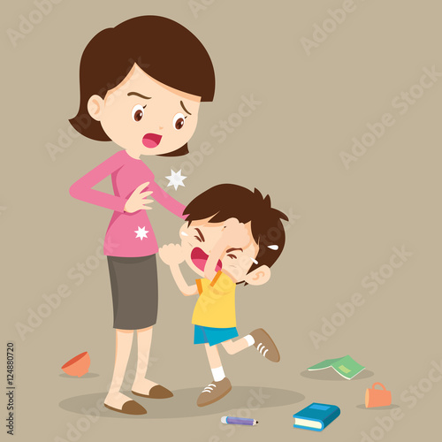 angry boy hitting him mother.Little angry boy crying and hitting mom.