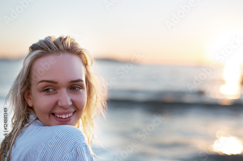 Beautiful girl portrait. Beach, sea coast, wind