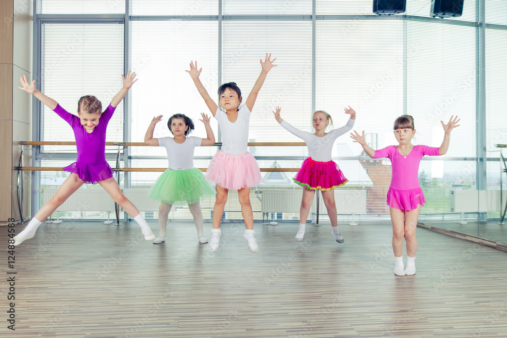 Naklejka premium happy children dancing on in hall, healthy life, kid's togethern