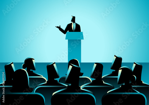 Man Giving A Speech On Stage