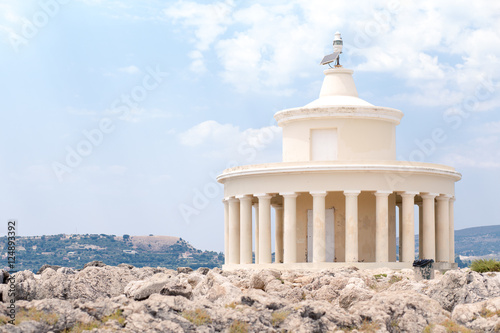 Famous lighthouse close to main town Argostoli in Kefalonia island in Greece. It was originally built in 1828. 