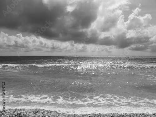 Seashore of Marina di Pisa beach in a cloudy day at summer. Tuscany, Italy