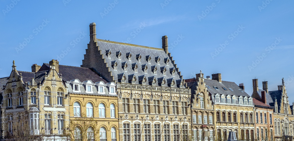 Characteristic Flemish high pitch roof lines in the main square of Ypres (Ieper), Belgium