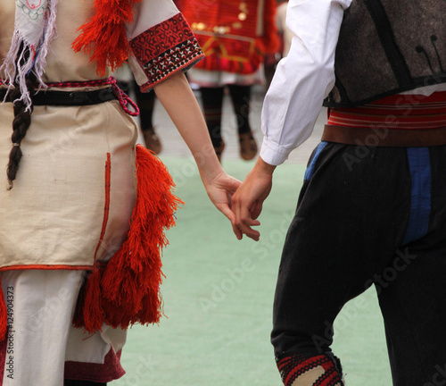Balkan dances in an outdoor festival photo