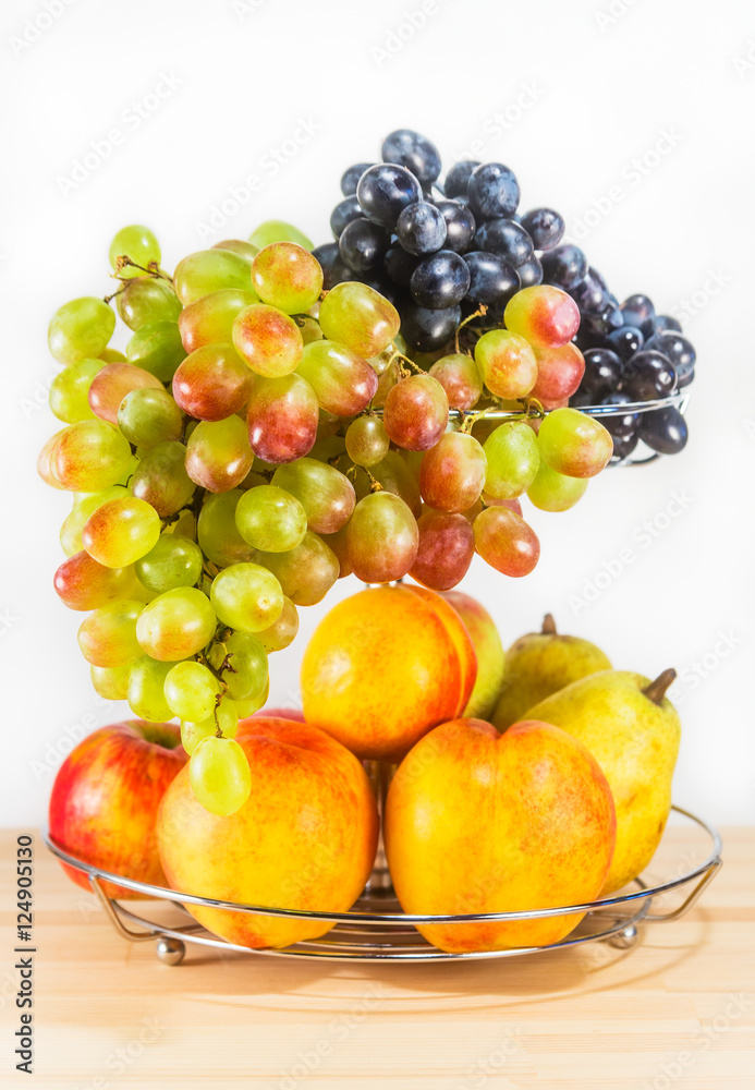 Fresh fruits on wooden table