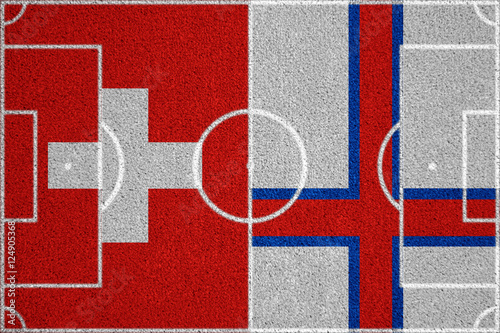 Flags Switzerland - Faroe Islands on the football field. 2018 football qualifiers