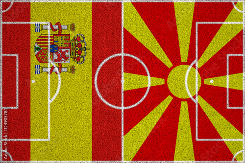 Flags Spain - Macedonia on the football field. 2018 football qualifiers